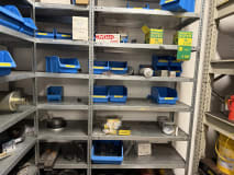 Shelving System with Spare Parts, Hydraulic Components, and Operating Supplies - Image 6