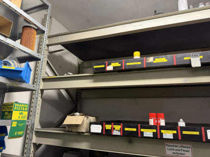 Shelving System with Spare Parts, Hydraulic Components, and Operating Supplies - Image 11