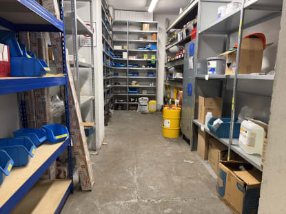 Shelving System with Spare Parts, Hydraulic Components, and Operating Supplies - Image 16