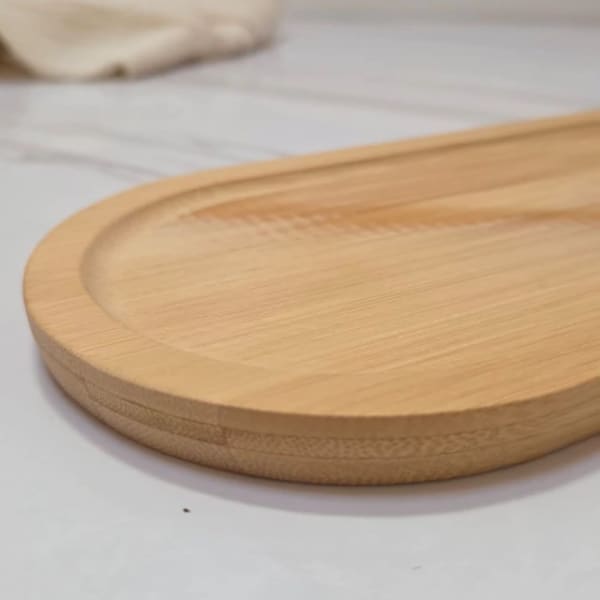 Tabla oval 33x13x1,3cm bamboo