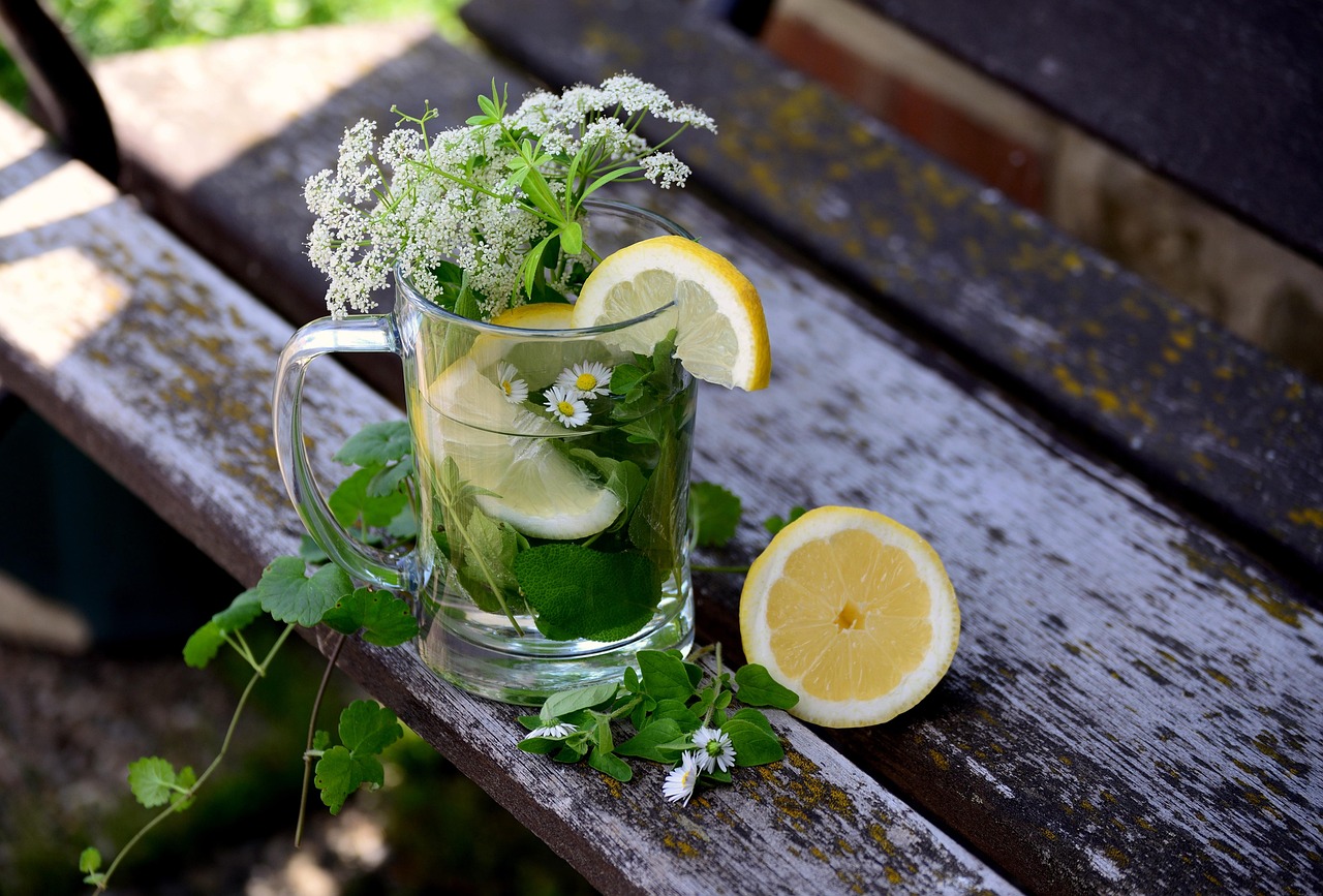Herb of lemon water and ginger to shrink the stomach