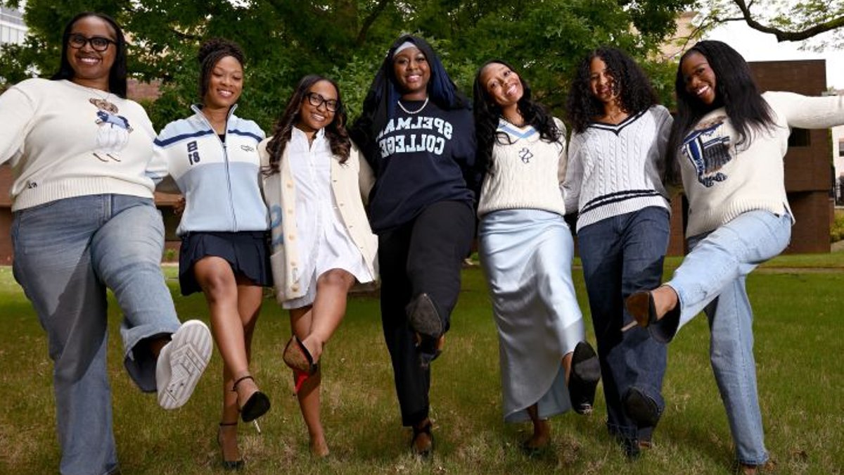 Spelman Seven valedictorians cross stage together
