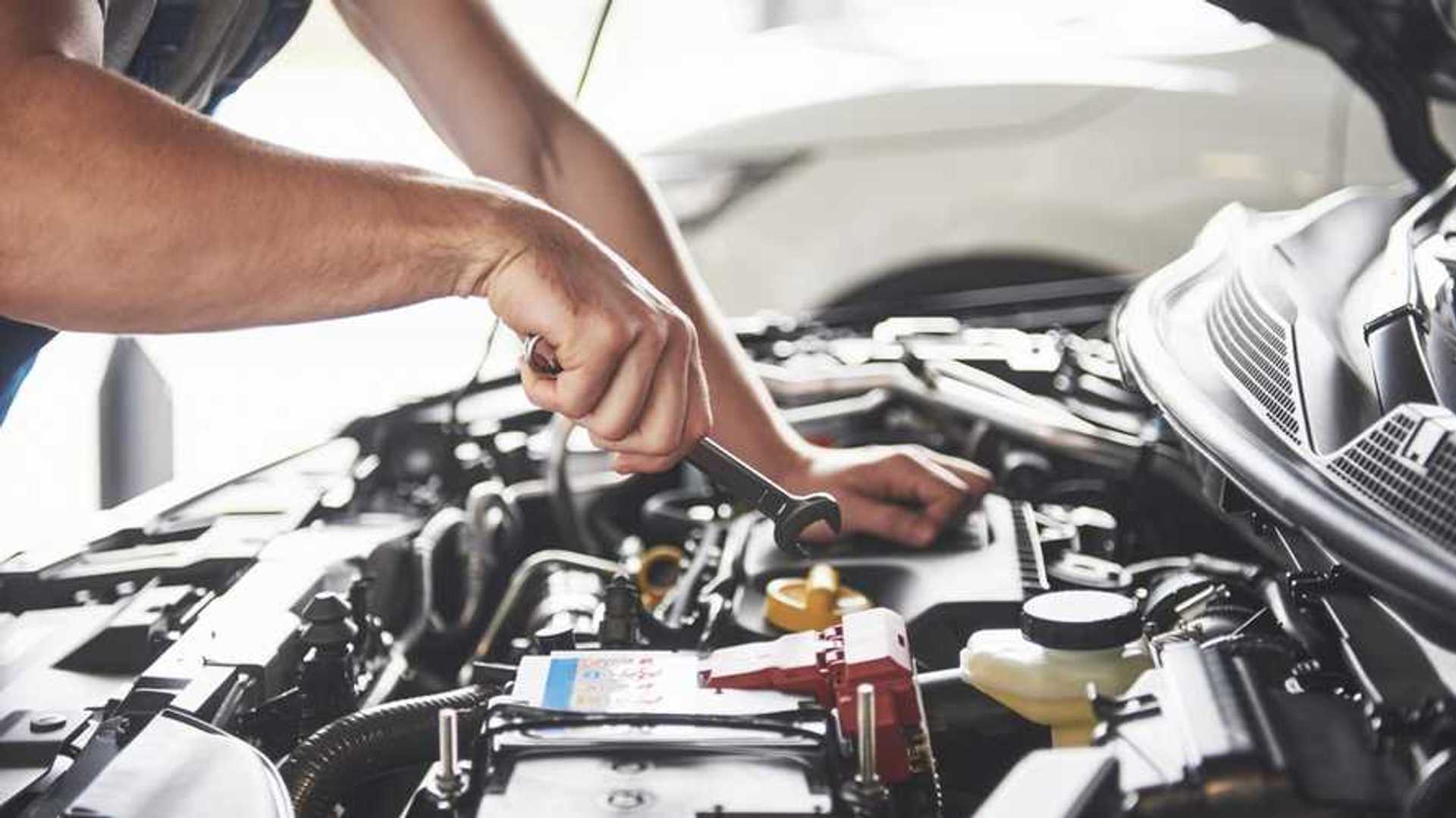 How can you do your own car servicing and general maintenance using a car repair manual?
