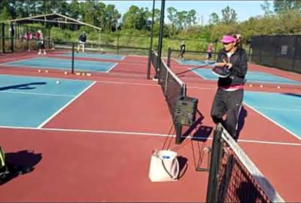 A Tran pickleball lesson w Simone
