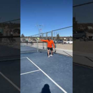 Backhand pickleball serve.