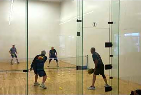 Pickleball on a four wall Racquteball ct. A new game Pickle Racquet invented in Irvine CA