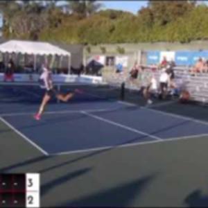 Ben Johns defends an ATP shot with an Erne