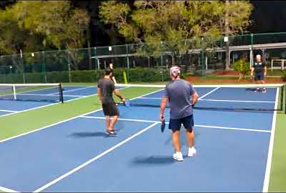 Pickleball Doubles Action at night with coach David Wyrsch