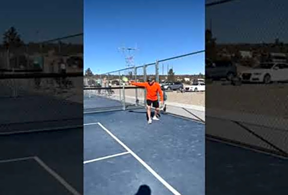 Backhand pickleball serve.