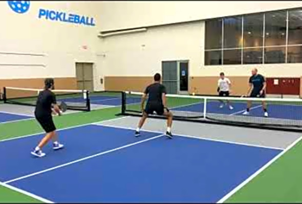 Tweener between the legs in a Pickleball game