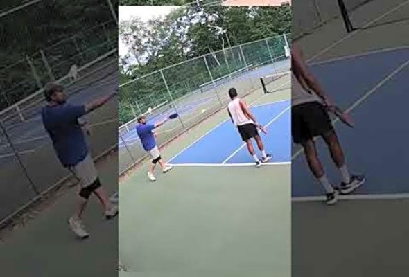 Pickleball smashing the ball