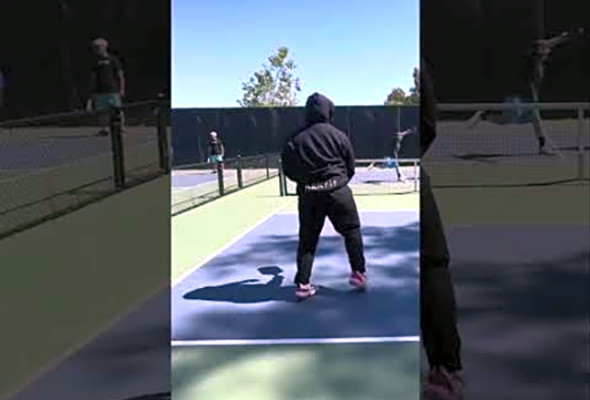 Pickleball Return: Black Hoodie Player&#039;s Intense Back-and-Forth!