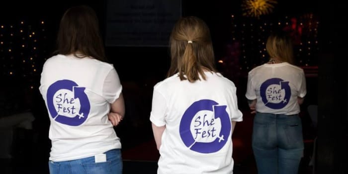 How can Womens' and LGBT+ communities build inclusive spaces?