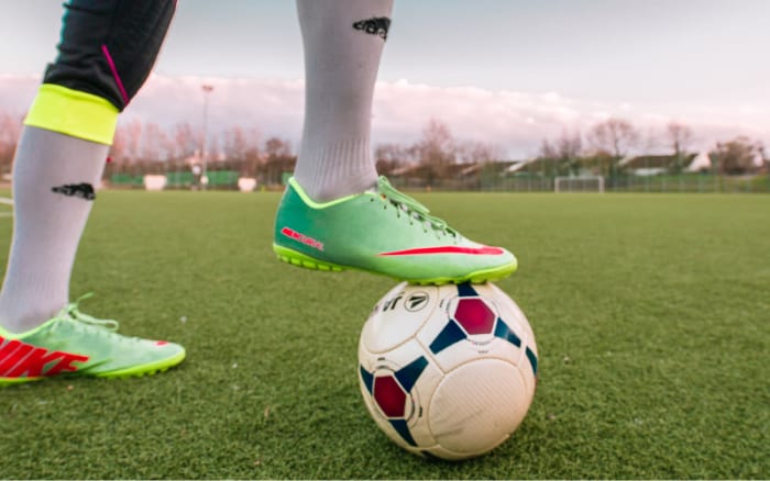 Football club suspends striker over homophobic comments
