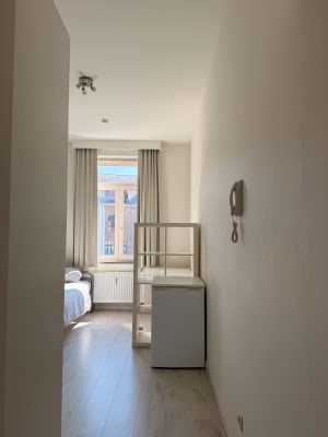 Zimmer Modern studentenkot te huur in hartje Leuven – 16,5 m² met eigen sanitair Bild 11