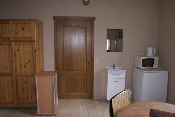 Sala Belle chambre à louer imagem 1