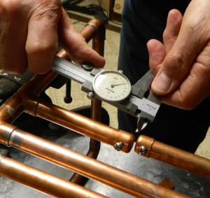 Heating/adjusting feed point tubes