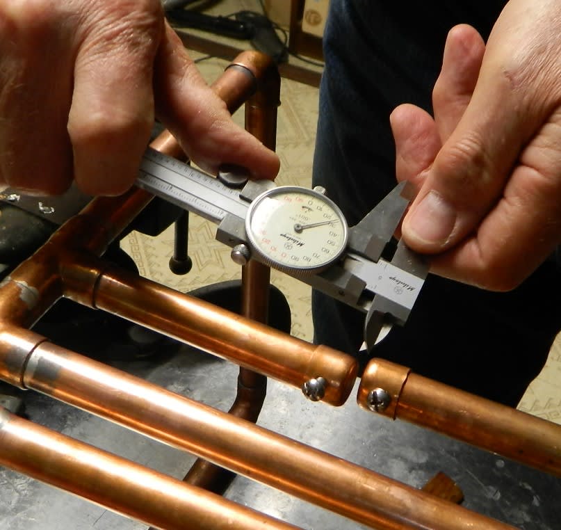 Heating/adjusting feed point tubes