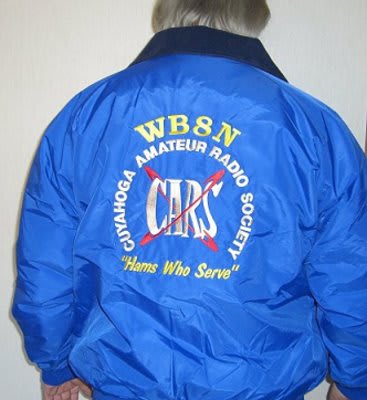 Man wearing a blue CARS jacket, embroidered with callsign - back view