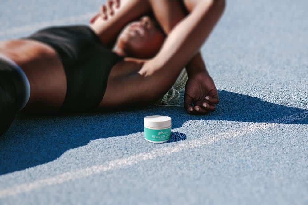 An athlete using CBD to recover after a workout