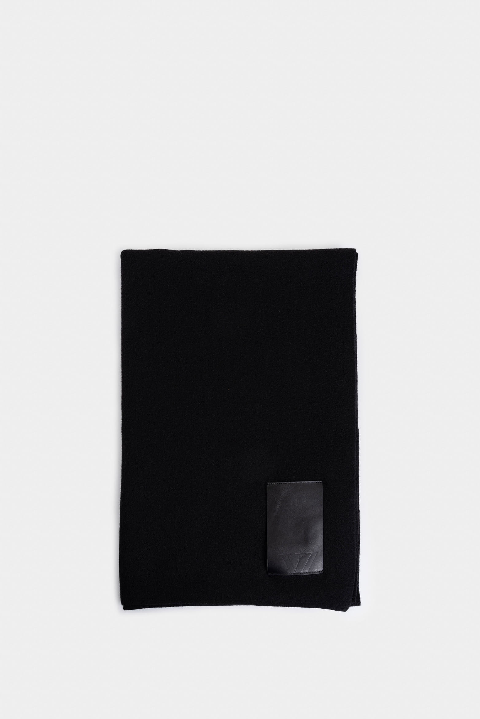 Bufanda Lucca monocolor para hombre detalle cuero