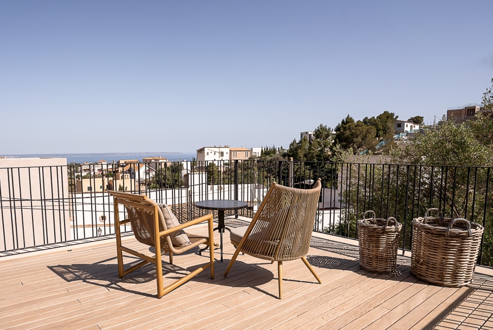 Upper terrace with two chairs, looking over Gènova toward the sea, Falco 10