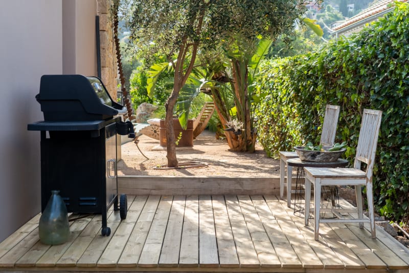 Covered barbecue and outdoor dining area