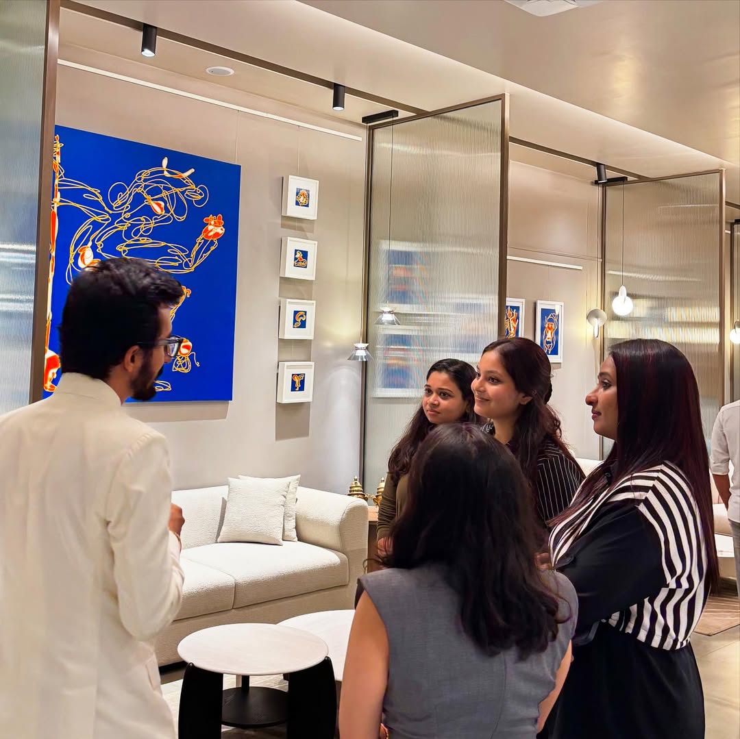 Zala's 'Neelantara' featuring blue ritualistic figures with intricate geometric patterns