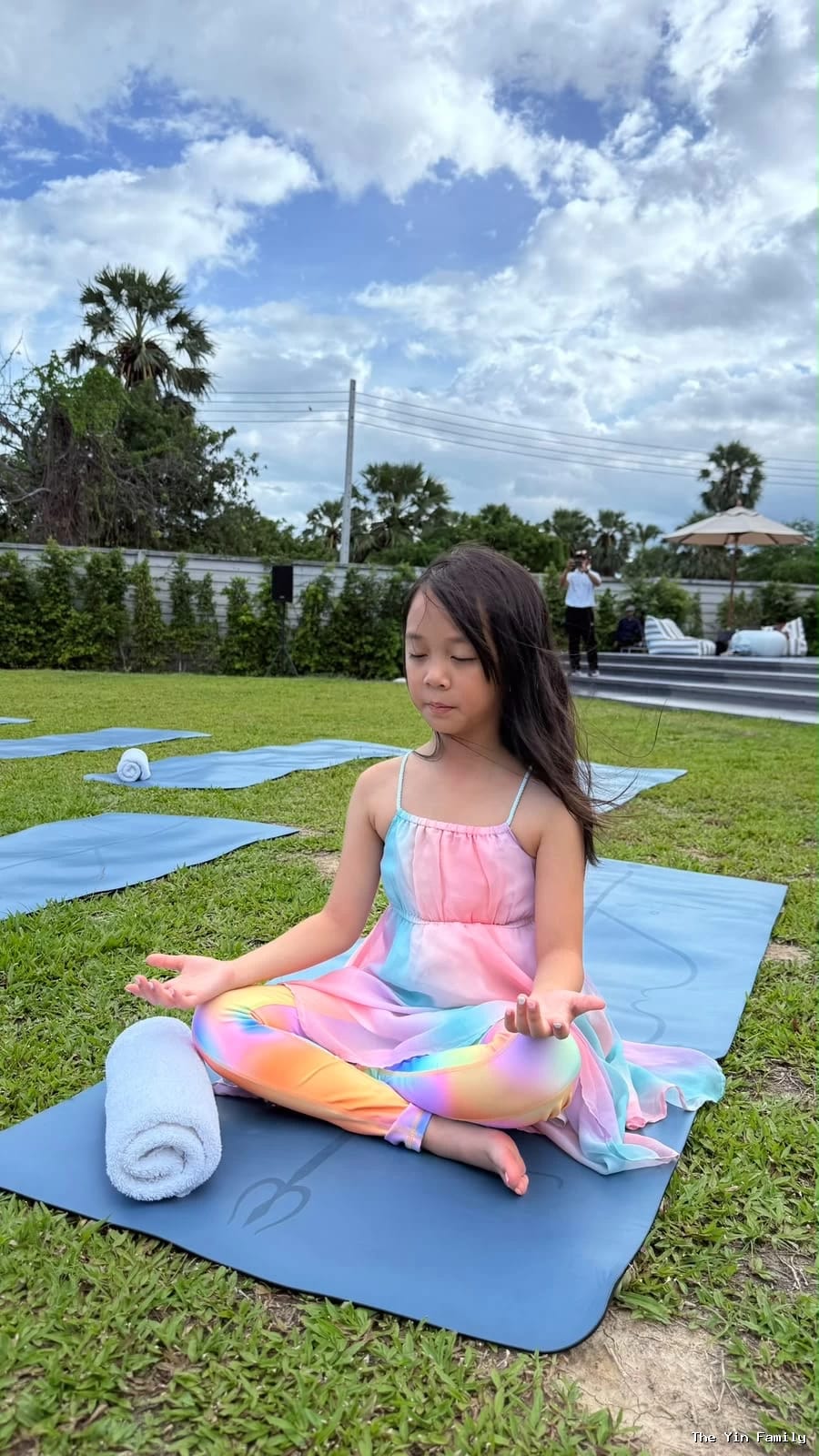 Doing Yoga beside the beach