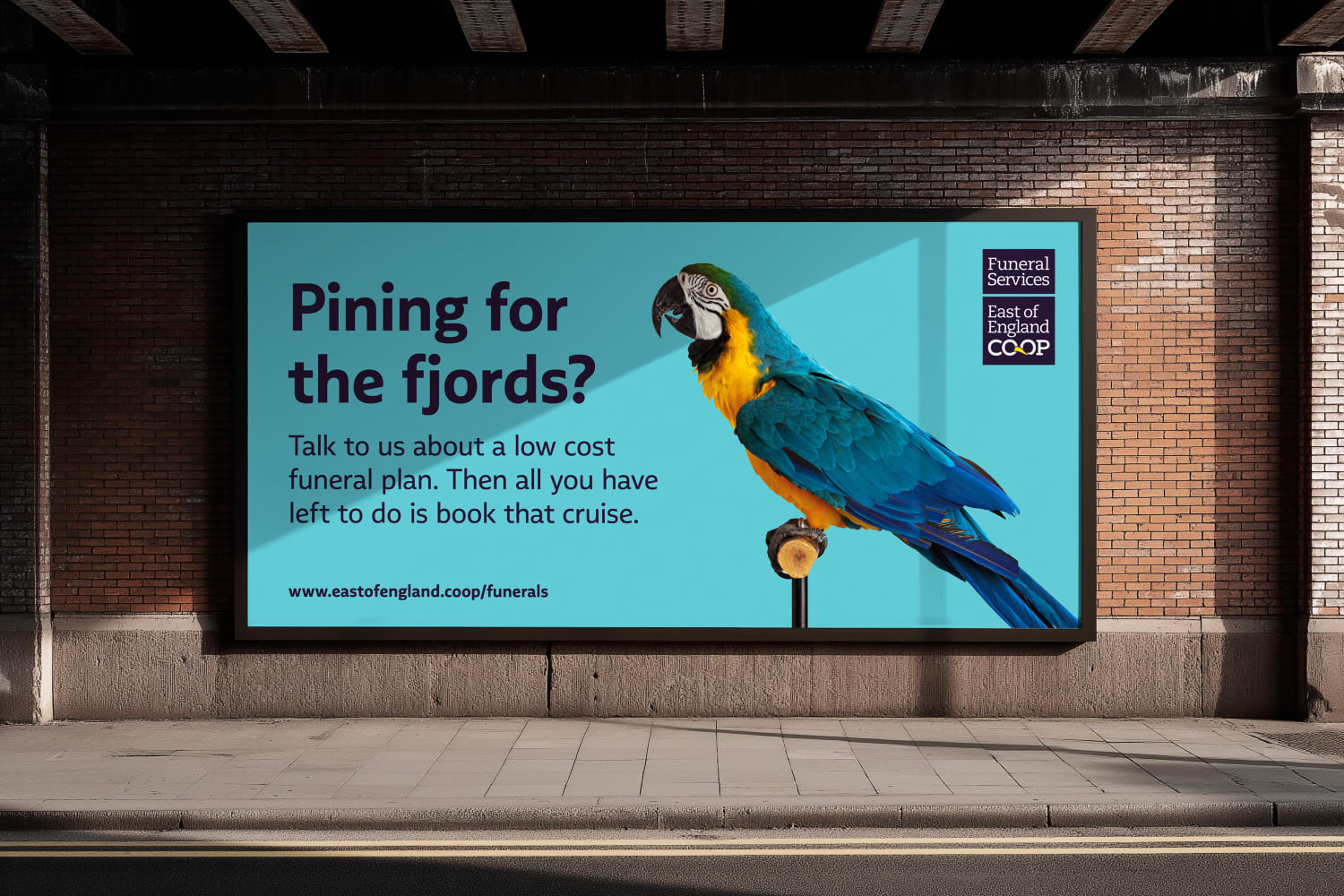 Photo of a billboard showing a parrot with the words Pining for the fjords? as an advert for the Co-op funeral services