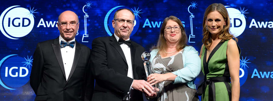 Joint CEO Roger Grosvenor and Board President Sally Chicken receiving the IGD award.