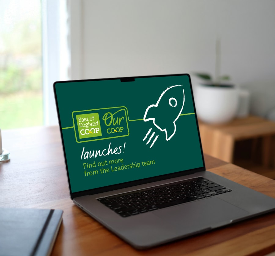 Our Co-op initiative launch screen, shown on a laptop.