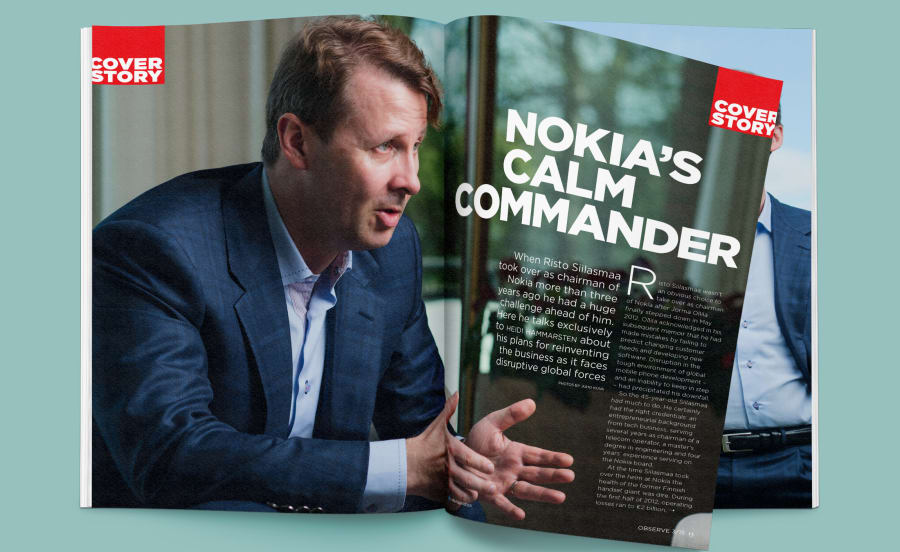 Double page spread of Observe magazine, showing Nokia’s chairman Finn Risto Siilasmaa being interviewed, leaning forward and using his hands to emphasise his point.