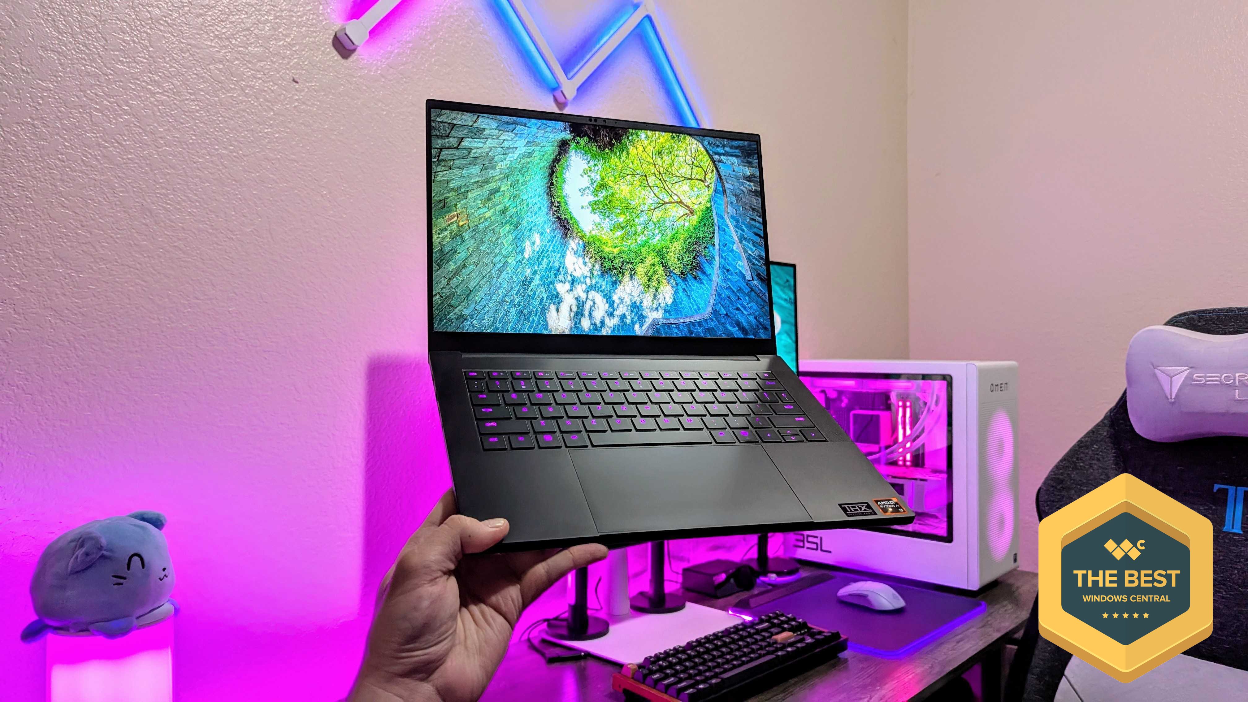 Razer Blade 14 RTX 5070 laptop open showing design and keyboard