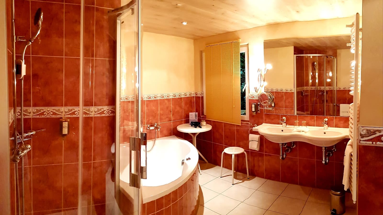 Comfortable bathroom at Waldhotel Doldenhorn Kandersteg