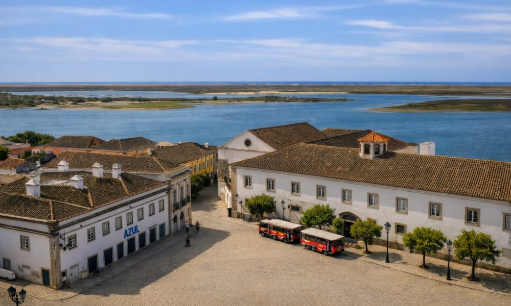 View from Faro Cathedral over historic rooftops and the Ria Formosa