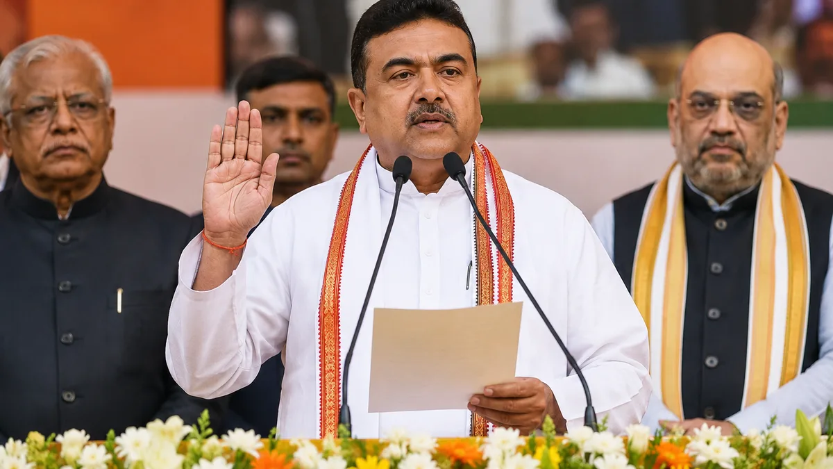 Suvendu Adhikari taking oath as West Bengal Chief Minister in Kolkata with BJP leaders and huge public crowd