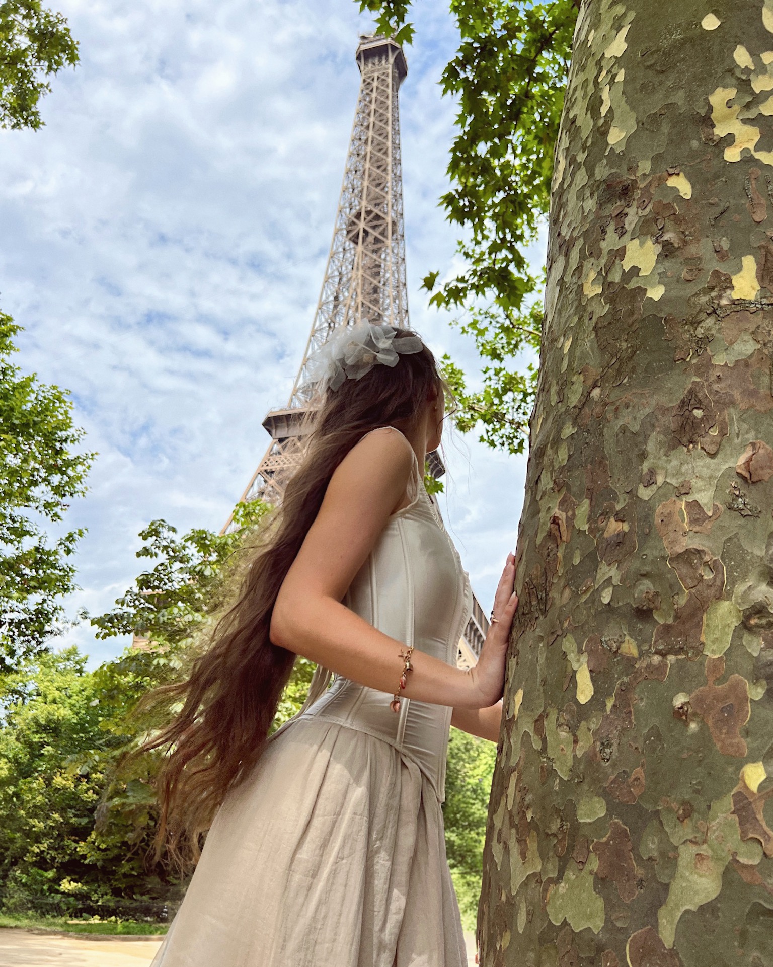Jackie Wyers in front of the Eiffel Tower in Paris France