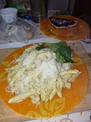 Creamy penne pasta with turkey, mushrooms and Parmesan cheese