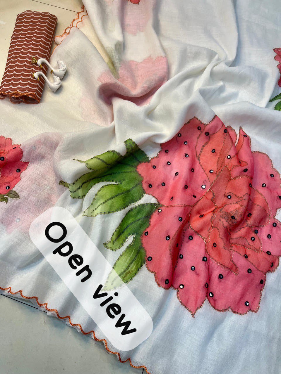 A Elegant White Linen Saree with Red Floral & Mirror Work