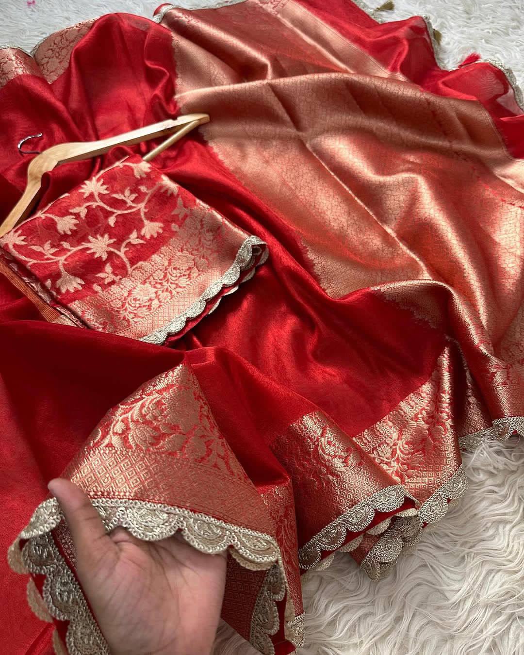 A Designer Banarasi Maharani Tissue Silk Saree with handwork lace border for weddings