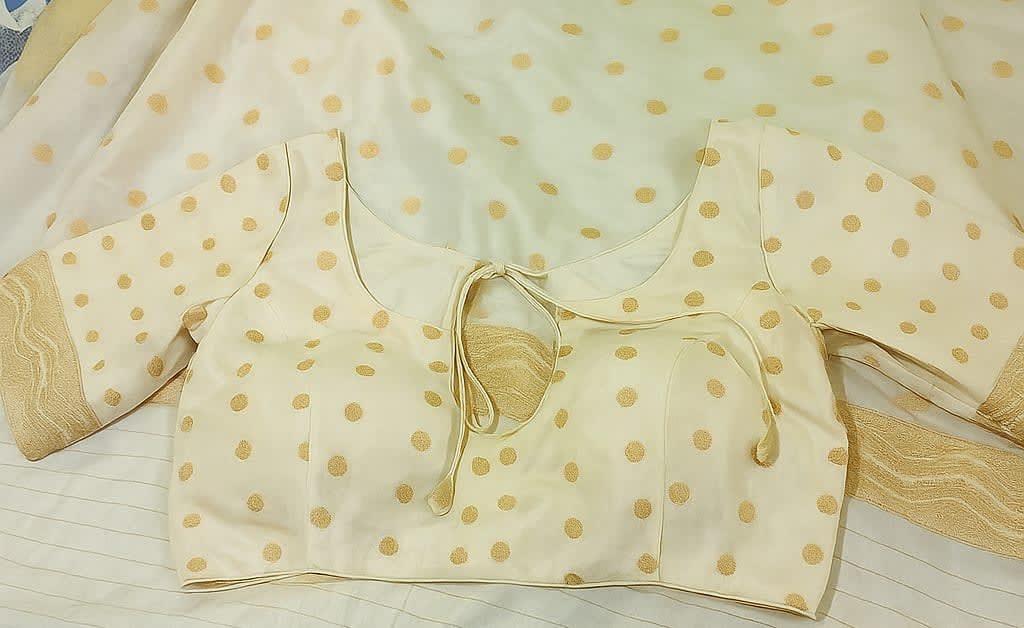 Elegant Off-White Banarasi Silk Saree with Golden Zari Work