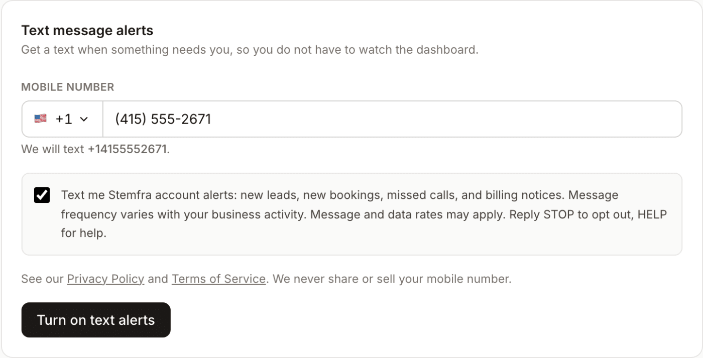 The same card with a mobile number filled in, the number echoed back in full international format, the consent checkbox ticked, and the "Turn on text alerts" button now enabled.