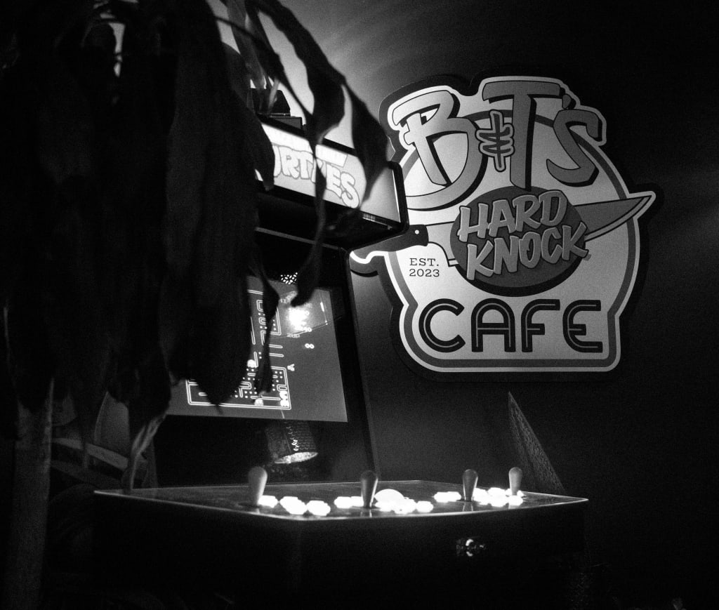 black and white picture of arcade