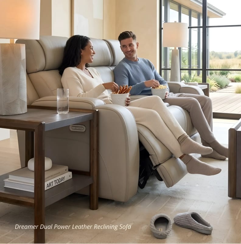 Dual power leather reclining sofa with couple relaxing in a modern living room – comfortable and stylish furniture for Chicago homes