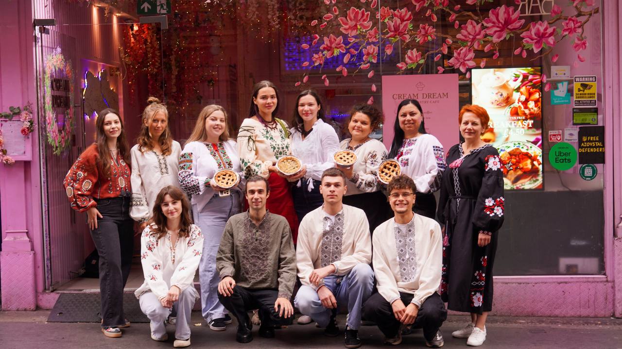 The Cream Dream Café team in their beautiful café space, showcasing the warm and welcoming atmosphere