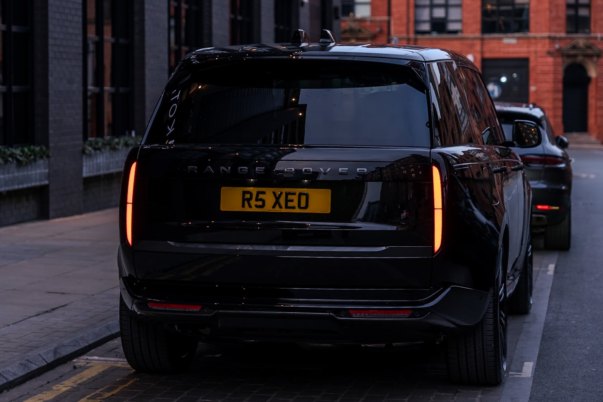 R5 Executive corporate chauffeur, Range Rover at the kerb