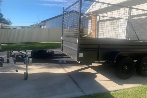 Trailer for HIRE - 10 foot x 5 foot dual axle with high cage and drop down ramp