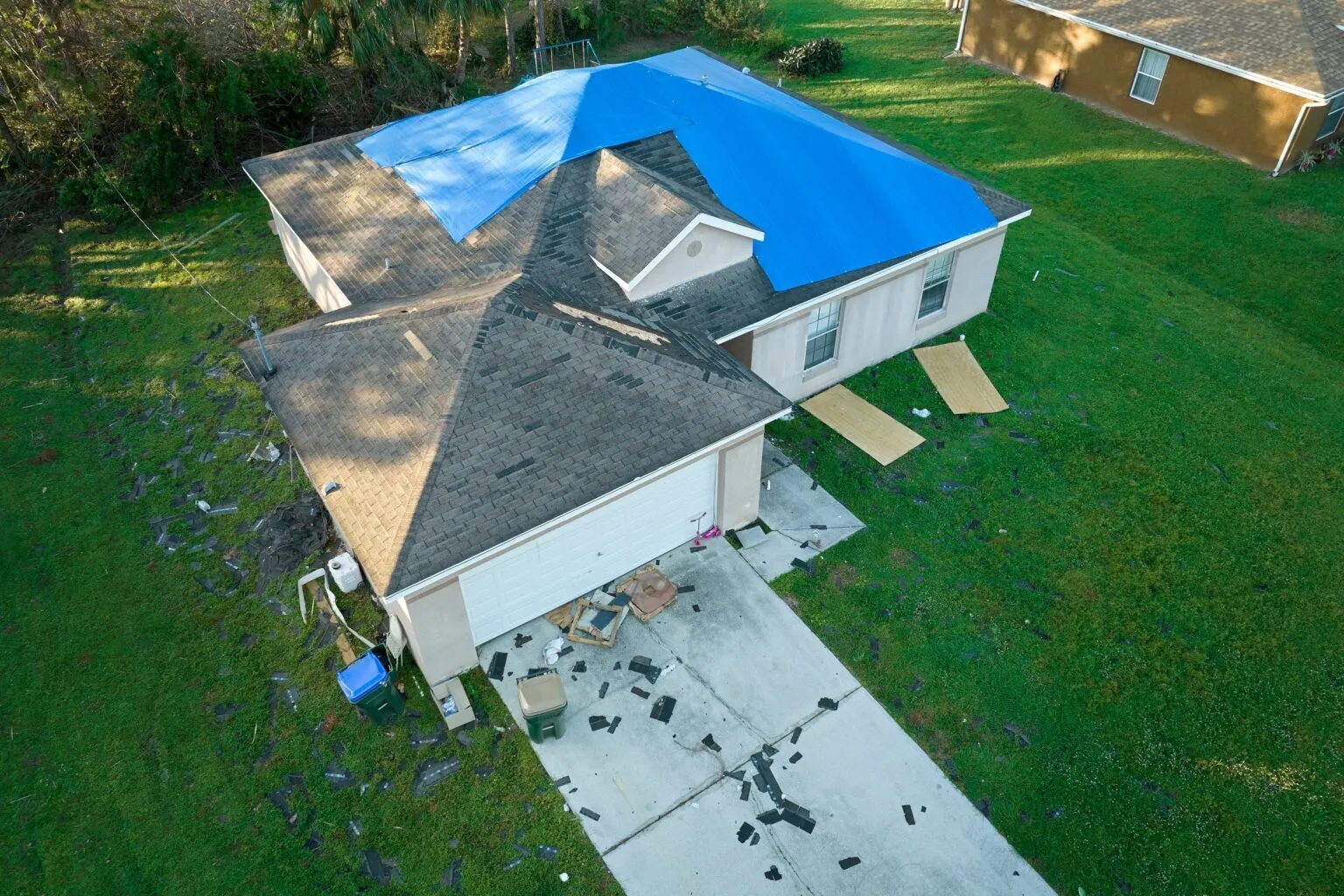 High-resolution top-down aerial view of roof shingles for storm damage documentation
