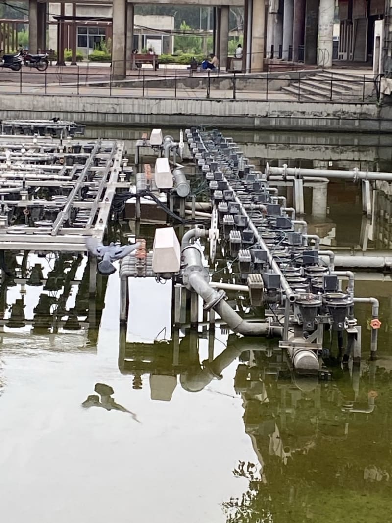 Musical fountain — the concealed reservoir beneath the deck